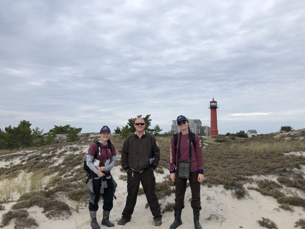Kayleen Larose and Crew Members in Front of Lighthouse